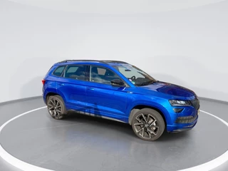 Skoda Karoq 1.5 TSI ACT 150pk DSG Sportline Business · Panoramadak · Camera · Trekhaak · Apple/Android Car Play · 19'' LMV · Keyless ·