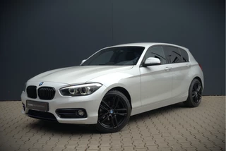 BMW 1 Serie 118i Sport Line Edition | Stoelverwarming | Cruise Control | Parkeersensoren | Navigatie | Groot Scherm | Digitale Tellers | Automaat | Keyless | Trekhaak | LED