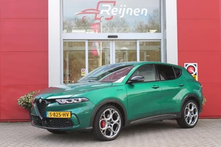 Hoofdafbeelding Alfa Romeo Tonale Alfa Romeo Tonale 1.5T Hybrid 160PK VELOCE | AFNEEMBARE TREKHAAK | PREMIUM PACK: LEDEREN BEKLEDING/GEVENTILEERDE VOORSTOELEN/4-VOUDIG ELEKTRISCH VERSTELBARE LENDESTEUN VOORSTOELEN/ELEKTRISCH BEDIENBARE VOORSTOELEN/GEHEUGEN OP DE BESTUUDERSSTOEL/HOOGGLANS ZWARTE RAAMOMLIJSTING/AMBIENT LIGHTING | TECHNOLOGY PACK: PARKEERWAARSCHUWING VOOR EN ACHTER/360° CAMERA/AUTOMATISCH INPARKEREN/ AUTONOMOUS DRIVING LEVEL 2: ADAPTIVE CRUISE CONTROL/LANE CENTERING ASSIST/TRAFFIC JAM ASSIST DODEHOEK DETECTIE AUTOMATISCH DIMMENDE BUITENSPIEGELS ELEKTRISCH BEDIENBARE ACHTERKLEP | WINTERPACK: STOELVERWARMING VOOR/STUURVERWARMING/VERWARMBARE RUITENSPROEIERS | HARMAN KARDON SOUND SYSTEM | 20" LICHTMETALEN VELGEN "GRAPHITE GREY" | DRAADLOZE TELEFOONLADER | NAVIGATIE | DRAADLOZE APPLE CARPLAY/ANDROID AUTO | FULL LED MATRIX KOPLAMPEN |