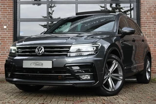 Hoofdafbeelding Volkswagen Tiguan Volkswagen Tiguan 1.4 TSI ACT 2x R-LINE Pano Vol Leder Virtual '18