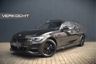 BMW 3 Serie Touring 330e xDrive High Executive M Sport | M Performance | Panoramadak | Harman Kardon | Invidiual Citrinschwarz II Metallic | Stoelverwarming | Camera | M Sport Remmen | Adaptive Cruise Control | Navigatie | Ambiance Verlichting | 