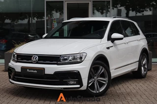Hoofdafbeelding Volkswagen Tiguan Volkswagen Tiguan 1.4 R-Line TSI | Virtual | Navi | Adaptive | Trekhaak | Stoelverwarming | Carplay | Sensoren | DAB