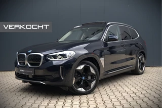 Hoofdafbeelding BMW iX3 BMW iX3 High Executive 80 kWh | Panoramadak | Keyless | Stoelverwarming | Harman Kardon | Memory Seat | Head-Up Display | 360 Camera | Adaptief Onderstel | Trekhaak | Adaptive LED | Elektrische Stoelen | Apple Carplay |