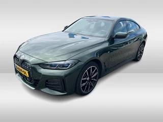 BMW i4 eDrive40 High Executive 84 kWh / SoH 99% / Trekhaak / Schuifdak / Camera / Head-up / Leder / 19'' / CarPlay / Stoelverwarming / Sfeerverlichting / Dodehoek / ACC