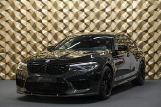 Hoofdafbeelding BMW M5 BMW 5-serie M5 V8 600pk NLauto Keramisch Carbon dak Massage Rear-entertainment Bowers&Wilkins Stoelkoeling HELEMAAL VOL!!!