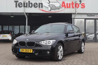 BMW 1-serie 118i Executive | Schuif-/kanteldak | Xenon | Parkeersensoren | Climate control