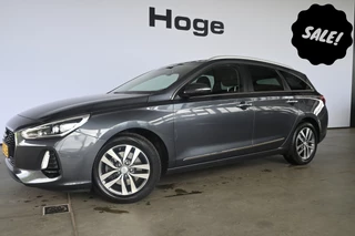 Hoofdafbeelding Hyundai i30 Hyundai i30 Wagon 1.4 T-GDI Premium Clima Cruise Control Navigatie LED Rijklaarprijs Inruil Mogelijk!