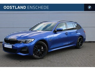 Hoofdafbeelding BMW 3 Serie BMW 3 Serie Touring 330e xDrive High Executive M Sport Automaat / Sportstoelen / Live Cockpit Professional / Cruise Control / Stoelverwarming