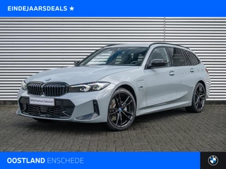 BMW 3 Serie Touring 320e M Sport Automaat / Sportstoelen / Active Cruise Control / Achteruitrijcamera / Parking Assistant / Stoelverwarming / Live Cockpit Plus