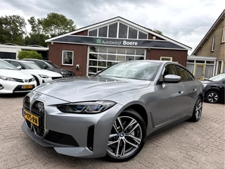 Hoofdafbeelding BMW i4 BMW i4 eDrive40 High Executive 84 kWh Camera, 18''Lmv,  elek.Trekhaak