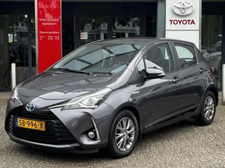 Toyota Yaris 1.5 Hybrid DESIGN NAVI CRUISE CLIMA CAMERA BLUETOOTH 15'' LM-VELGEN NL-AUTO