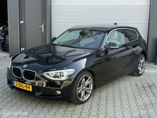 Hoofdafbeelding BMW 1 Serie BMW 1-serie 114i Business Sport Line| Pdc| Nap ✅