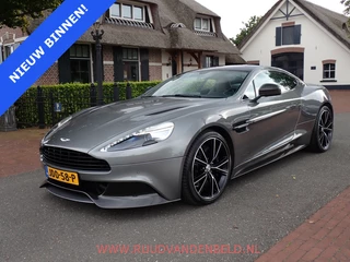 Hoofdafbeelding Aston Martin V12 Vanquish Aston Martin V12 Vanquish 6.0 Touchtronic 2+2 CARBON // B&O // 1st OWNER!