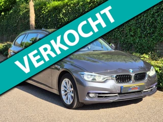Hoofdafbeelding BMW 3 Serie BMW 3-serie Touring F31 High Executive Sport Elk. Trekhaak Navi RIJKLAAR NEW APK Grijs Garantie MOG.