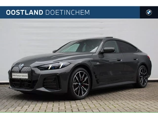 Hoofdafbeelding BMW i4 BMW i4 eDrive40 Gran Coupé M Sport / Schuif-kanteldak / Achteruitrijcamera / Adaptieve LED / Active Cruise Control / Comfort Access / Stuurverwarming
