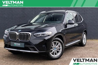 Hoofdafbeelding BMW X3 BMW X3 xDrive30e High Executive PANORAMADAK TREKHAAK MEMORY CAMERA