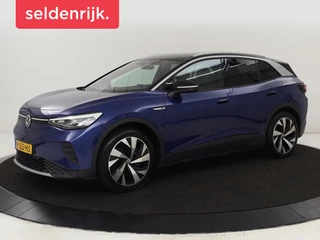 Hoofdafbeelding Volkswagen ID.4 Volkswagen ID.4 First 77 kWh | Trekhaak | Sfeerverlichting | Camera | Navigatie | Stoelverwarming | Carplay | LMV 20 inch | LED | Cruise Control | Getint glas | Climate controle