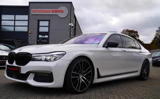 BMW 7-serie 740Li High Executive | Panorama | Harman/Kardon | Adaptieve cruise | HuD | LED | Parelmoer wit | M-pakket | 20 inch |