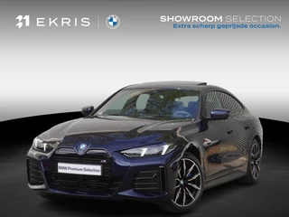 BMW i4 eDrive35 M Sportpakket | Comfort Pack | Stuurwielrand verwarmd | Trekhaak met elektrisch wegklapbare kogel | Elektrisch bediend glazen schuif-/kanteldak | Extra getint glas