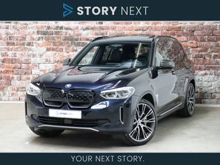 BMW iX3 High Executive Shadow Line Automaat / Trekhaak / Panoramadak / Harman Kardon / Surround View / Gesture Contol / Live Cockpit Professional / Elektrisch Verstelbare Sportstoelen / Driving Assistant Plus / Sport Comfort Access / 21 Inch