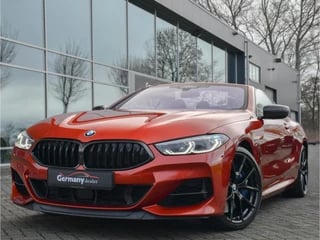 Hoofdafbeelding BMW 8 Serie BMW 8 Serie M850i 531pk xDrive High Executive Sunset Orange 4W Sturing Carbon Core