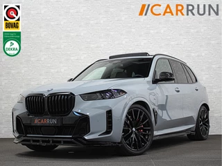 BMW X5 50e M-Sport Pro | M-Stoelen | Carbon | Achterasbesturing | ACC | Panorama | 360 Camera | Soft-Close | Head-Up | M-Gordels | Trekhaak | Harman-Kardon | 22 inch | Individual Leder | Stoelventilatie | Stoelverwarming V+A | Keyless-Entry | Memory | Stuurverwarming | Iconic-Glow | Rij-Assist Pro | Beker Koeling & Verwarming | Zonwering |