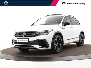 Volkswagen Tiguan 1.4 TSI 245pk DSG eHybrid R-Line Business · Panoramadak · Leder · 360 Camera · Inklap. Trekhaak · Matrix LED · Side Assist · Keyless · Stuur- & Stoelverwarming ·