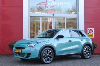 Fiat 600 1.2 HYbrid 110PK LA PRIMA | ELEKTRISCH VERSTELBARE BESTUURDERSTOEL MET MASSAGEFUNCTIE | NAVIGATIE | DODEHOEK DETECTIE | ELEKTRISCHE ACHTERKLEP | LEDKOPLAMPEN-MISTLAMPEN | LED ACHTERLICHTEN | PACK COMFORT: ACHTERUITRIJCAMERA / PARKEERSENSOREN VOOR-ACHTER / DRAADLOOS TELEFOONLADEN / DRAADLOOS APPLE CARPLAY - ANDROID AUTO / KEYLESS ENTRY-START / AUDIOSYSTEEM MET 6 SPEAKERS | WINTER PACK: VERWARMBARE VOORSTOELEN / VERWARMBARE VOORSTOELEN | 18"LICHTMETALEN VELGEN TWO-TONE | EXTRA GETINTE ACHTERRUITEN | CLIMATE CONTROL |