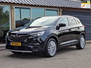 Hoofdafbeelding Opel Grandland X Opel Grandland X Grandland 1.2 Turbo Business Executive (Trekhaak / Panodak / Leder / Sportstoelen / Climate / Cruise / Dodehoek)