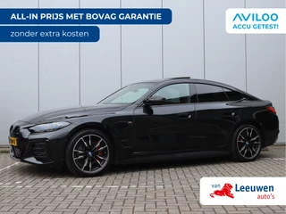 Hoofdafbeelding BMW i4 BMW i4 M50 High Executive 84 kWh | H&K | Pano | Trekhaak | Leder | Head-Up