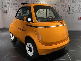 Hoofdafbeelding Microlino Competizione MICROLINO COMPETIZIONE 10.5 kWh 100% ELEKTRISCH UNIEK EYECATCHER ZONNEDAK 177KM RIJBEREIK