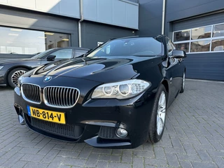 BMW 5 Serie met nieuwe APK! Trekhaak, PDC, airco, navigatie, cruise control, met M-pakket