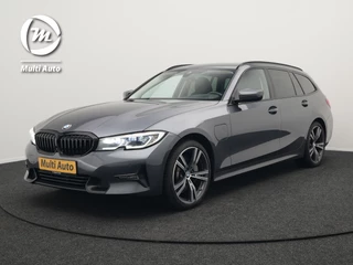 Hoofdafbeelding BMW 3 Serie BMW 3 Serie Touring 330e Sportline Plug In Hybrid 293pk PHEV | Trekhaak af Fabriek | Laser LED | Head Up | Lederen Sportstoelen Verwarmd | Harman Kardon | Apple Carplay | Keyless |