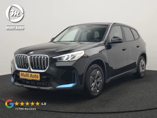 BMW iX1 xDrive30 67 kWh 313pk Dealer O.H. | Adaptief M Onderstel | Camera | Cruise Control | Stoelverwarming | Widescreen Navi | Park Assist | Apple Carplay | Navigatie | DAB | Standkachel |