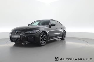 Hoofdafbeelding BMW i4 BMW i4 eDrive35 M Sportpakket | Pano | HUD | Camera | Stoel- Stuurerw. | Navi | Elek. trekhaak |