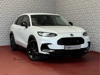 Hoofdafbeelding Honda ZR-V Honda ZR-V 2.0 e:HEV 184 PK STOELVERW CAMERA CARPLAY SPORT ELEK.STOEL PDC