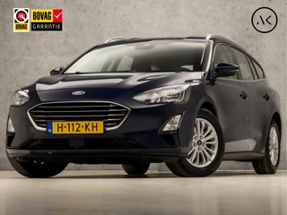 Ford Focus Wagon 1.0 Titanium (APPLE CARPLAY, GROOT NAVI, ADAPTIVE CRUISE, SPORTSTOELEN, KEYLESS, PARKEERSENSOREN, LM VELGEN, LED KOPLAMPEN, NIEUWE APK, NIEUWSTAAT)