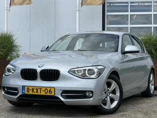 BMW 1 Serie 114i EDE Business Sport 100pk | Airco automatisch | Bi-xenon koplampen | Cruise control | Dab | Lichtmetalen velgen 16" | Navigatiesysteem full map | Parkeersensor achter | Dealer onderhouden!