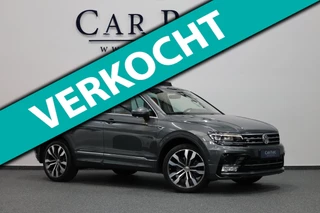Volkswagen TIGUAN 2.0 TSI 4Motion 220+PK R-LINE LED/VIRTUAL/HUD/PANO/LEER+S.VERWARMING+MEMORY/20"/360 CAM/LINE/ACC/12 MDN GARANTIE