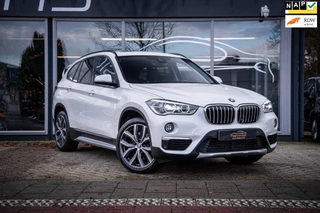 BMW X1 sDrive20i Orange Edition III|Trekhaak|Pano|LED|Ambiance|Camera