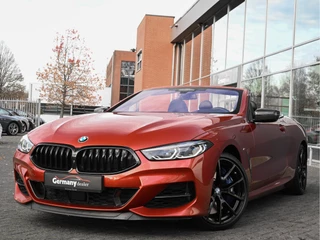 Hoofdafbeelding BMW 8 Serie BMW 8 Serie M850i 531pk xDrive High Executive Sunset Orange 4W Sturing Carbon Core