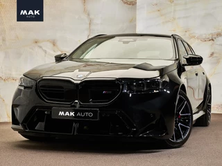 Hoofdafbeelding BMW M5 BMW M5 Touring V8 M Hybrid, pano, B&W, 21", stl.ventilatie, tr.haak, pano, leder, memory, keyless, privacy