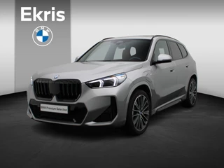 BMW X1 xDrive25e M Sportpakket | Premium Pack | Travel Pack | Stuurwielrand Verwarmd | Achteruitrijcamera | Panoramadak | Adaptieve LED koplampen | Driving Assistant Plus | DAB | Parking Assistant | Harman Kardon | 20''