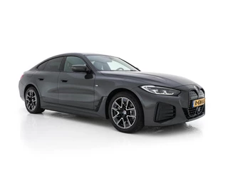 BMW i4 eDrive40 84 kWh M-Sportpack [ 3-Fase ] { SOH-95%} (INCL-BTW) *LEATHER-ALCANTARA | FULL-LED | ADAPTIVE-CRUISE | WIDE-SCREEN-DIGI-COCKPIT | DAB+ | CAMERA | AMBIENT-LIGHT | CARPLAY | SPORT-SEATS | PRIVACY-GLASS | TOWBAR | 18''ALU*