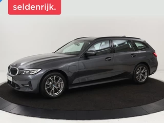 BMW 3-serie 330e Sport Line | Stoel & stuurverwarming |  Adaptive cruise | Sportstoelen | Trekhaak | Carplay | Sfeerverlichting | Half leder | Navigatie | Full LED