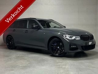 BMW 3-serie Touring 330e xDrive M Sport Davitgrau Laser Pano