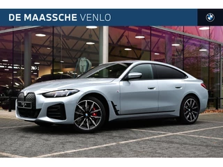 Hoofdafbeelding BMW i4 BMW i4 eDrive35 Gran Coupé M Sport / Achteruitrijcamera / Adaptieve LED / Active Cruise Control / Stoelverwarming /  Live Cockpit Plus