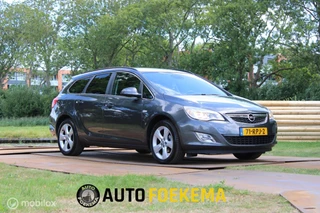 Hoofdafbeelding Opel Astra Opel Astra Sports Tourer 1.4 Turbo Edition LEKT OLIE