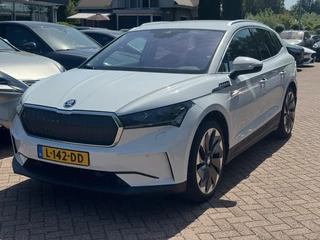 Škoda Enyaq iV 80 First Edition / SoH 91,4% / Trekhaak / Camera / Leder / CarPlay / Keyless / 21'' / Warmtepomp / Stuur+Stoelverwarming / Dodehoek / DAB / ACC