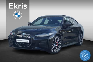 BMW i4 M50 M Sport Pro | Schuif-kanteldak / BMW Laserlicht /  Harman Kardon / M Adaptief onderstel / M Carbon exterieurpakket / M Stoelen / Trekhaak / Elektrisch stoelen /  20 Inch / Stoelverwarming voor en achter / Parking Assistant Plus